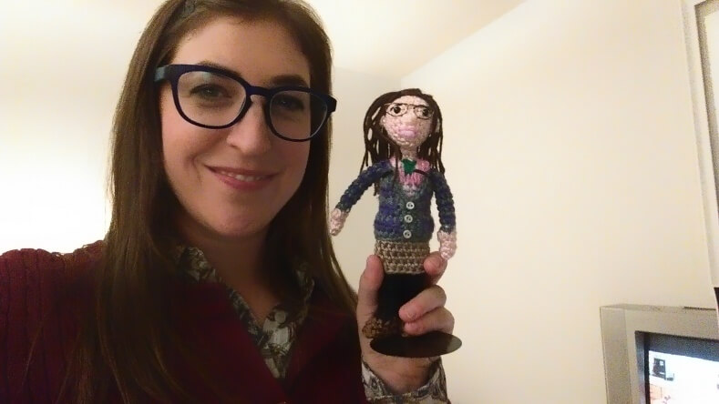 Here is me and my crocheted Amy Farrah Fowler doll which a fan made for me. I love the tiny buttons on her sweater. It gets a lot of compliments from visitors.