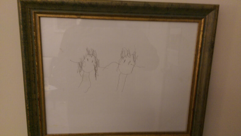My younger son did this drawing when he was about 4- just about old enough to realize I was going back to work and that he would miss me. It’s him and me holding hands. It makes me miss my kids but it reminds me how much they understand now about how their mom is a working mom.