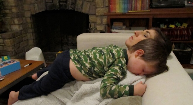 Mayim with her younger son when he had the flu a few years ago.