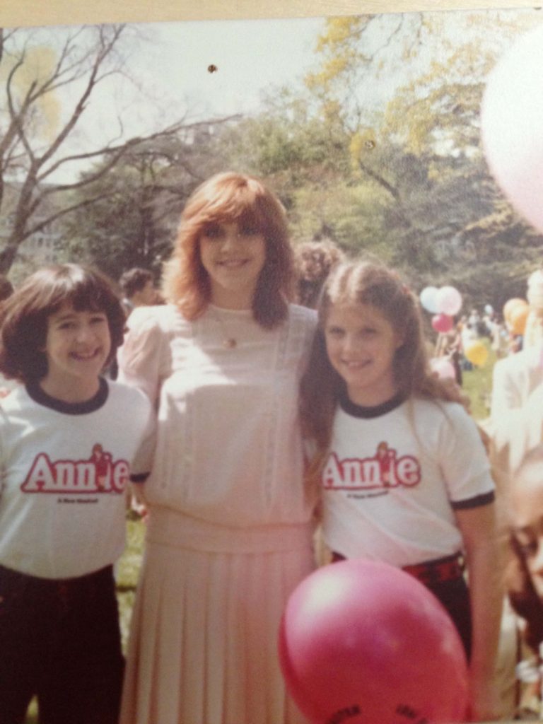 Stefanie as an Annie orphan with another orphan along with the original Annie, Andrea McCardle, performing at an Easter show at the White House.