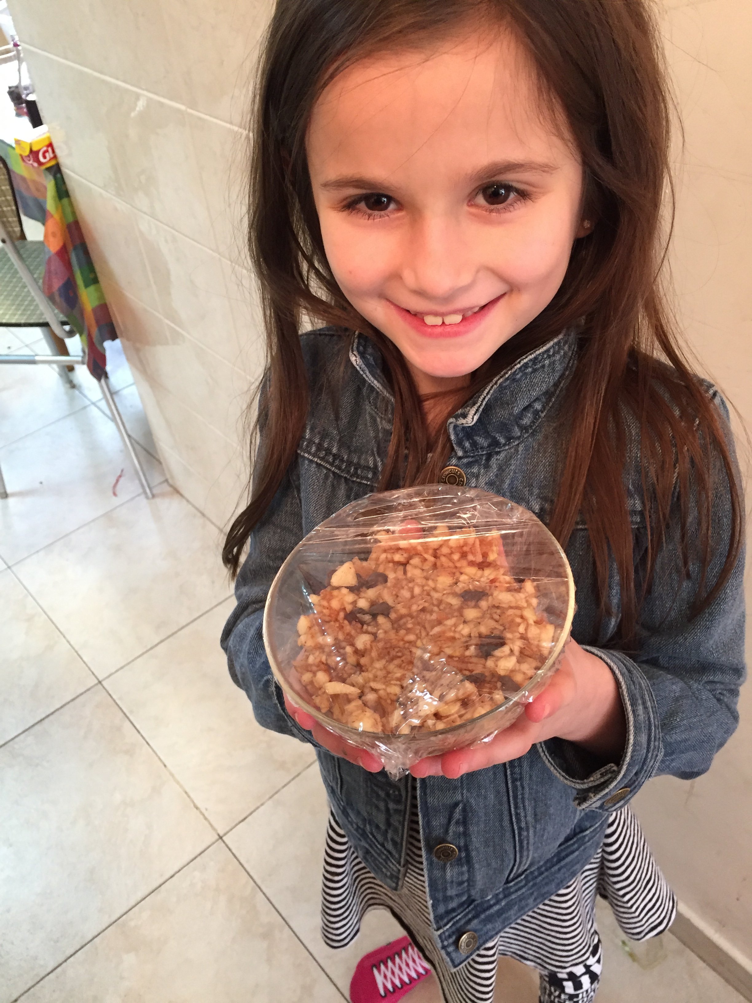 Esther's niece with charoset for passover