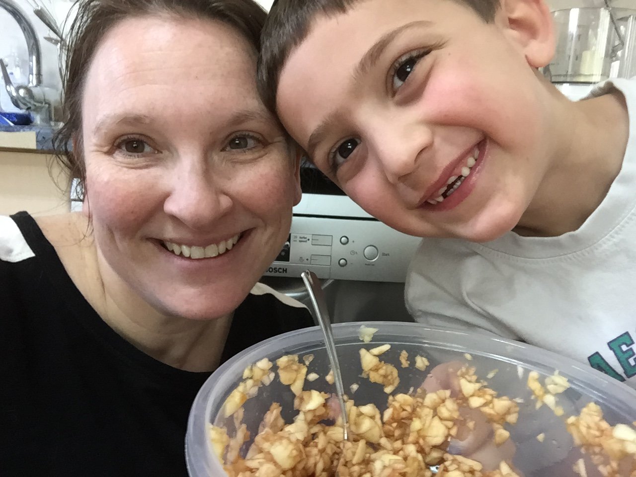 Esther with nephew preparing for passover