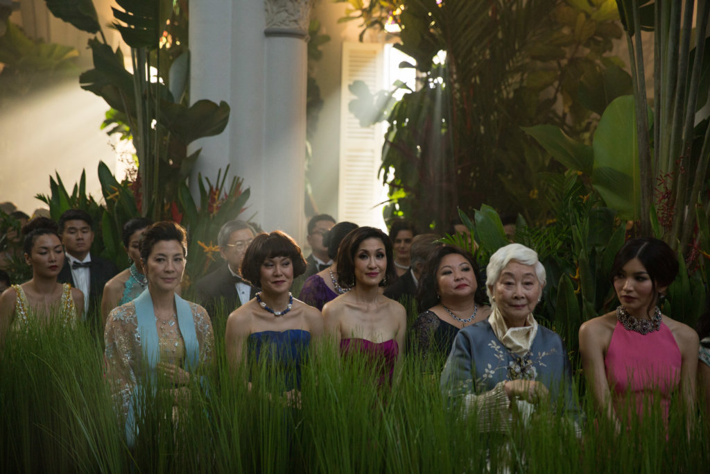 Michelle Yeoh as Eleanor, Janice Koh as Felicity, Amy J. Cheng as Jacqueline, Selena Tan as Alix, Lisa Lu as Ah Ma and Gemma Chan as Astrid in 'Crazy Rich Asians'