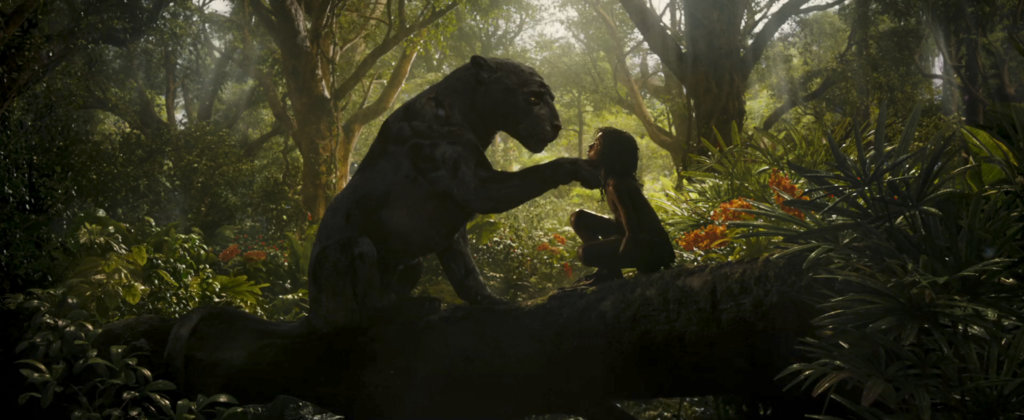 Bagheera and Rohan Chand as Mowgli in the Netflix film 'Mowgli: Legend of the Jungle'